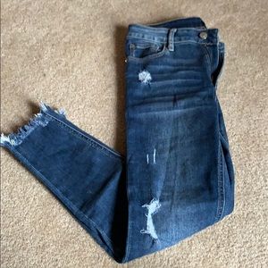 Cropped distressed skinny jeans